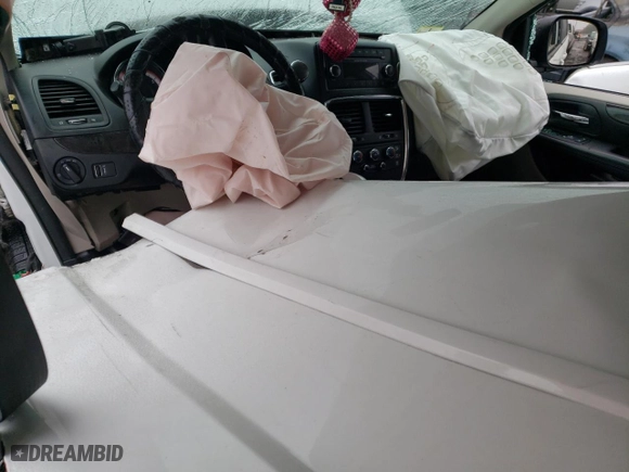 2014 Dodge Grand Caravan SE with VIN 2C4RDGBG0ER473442, listed as a Copart auction lot 49376295 with 106,092 mi miles and Salvage Title. Bid and sale history available at carsss.com. Image 8.