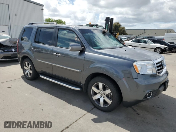 2012 Honda Pilot Touring with VIN 5FNYF4H96CB085752, listed as a Copart auction lot 51292515 with 190,383 mi miles and Salvage Title. Bid and sale history available at DreamBid. Image 4.
