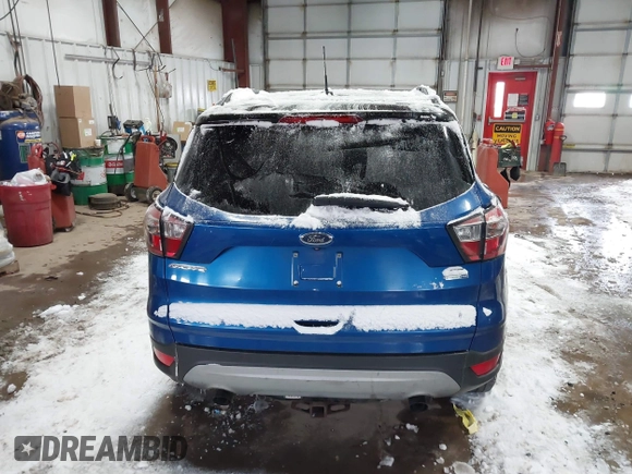 2017 Ford Escape SE with VIN 1FMCU9GD0HUD61453, listed as a IAAI auction lot 41596562 with 173,803 mi miles and . Bid and sale history available at DreamBid. Image 16.