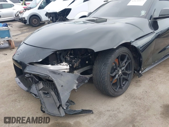 2021 Toyota Supra 2.0 with VIN WZ1DB2C07MW042723, listed as a IAAI auction lot 42635977 with 54,011 mi miles and . Bid and sale history available at DreamBid. Image 6.