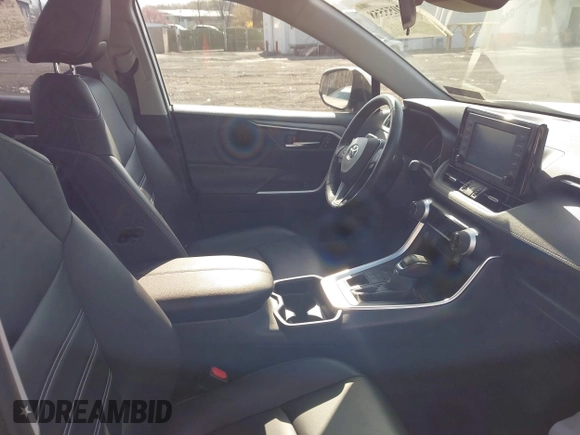 2019 Toyota RAV4 XLE Premium with VIN JTMA1RFV9KD013771, listed as a IAAI auction lot 42055558 with 36,585 mi miles. Bid and sale history available at carsss.com. Image 5.