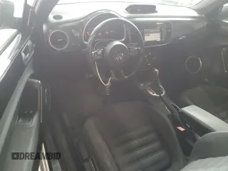2012 Volkswagen Beetle with VIN 3VWV67AT1CM663839, listed as a Copart auction lot 55009455 with 122,042 mi miles and Salvage Title. Bid and sale history available at DreamBid. Image 8.