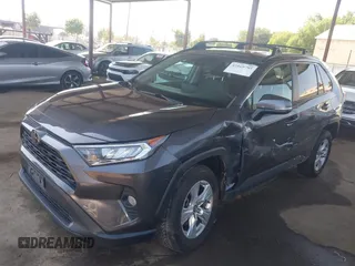 2020 Toyota RAV4 XLE with VIN 2T3W1RFV1LW079645, listed as a IAAI auction lot 42169795 with 126,247 mi miles and . Bid and sale history available at DreamBid. Image 2.