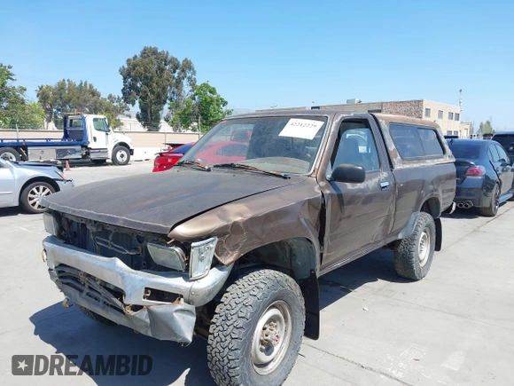 1989 Toyota Pickup DX with VIN JT4RN01PXK7010307, listed as a IAAI auction lot 42212229 with 389,623 mi miles and . Bid and sale history available at DreamBid. Image 6.
