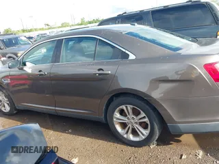 2015 Ford Taurus SEL with VIN 1FAHP2E87FG194170, listed as a IAAI auction lot 42184749 with 222,609 mi miles and . Bid and sale history available at carsss.com. Image 14.