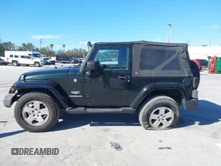 2012 Jeep Wrangler Arctic with VIN 1C4AJWBG7CL170079, listed as a IAAI auction lot 41004260 with 83,408 mi miles and . Bid and sale history available at DreamBid. Image 14.