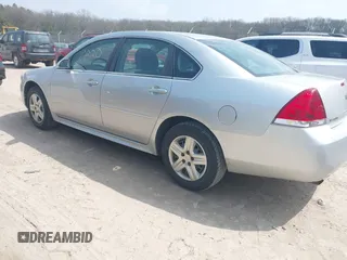 2014 Chevrolet Impala LS with VIN 2G1WA5E39E1105521, listed as a IAAI auction lot 42139820 with 168,063 mi miles and . Bid and sale history available at DreamBid. Image 3.