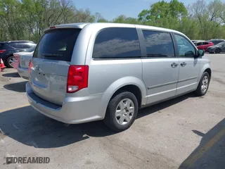 2012 Ram Cargo Van with VIN 2C4RDGAGXCR243180, listed as a IAAI auction lot 42061918 with 204,251 mi miles. Bid and sale history available at carsss.com. Image 4.