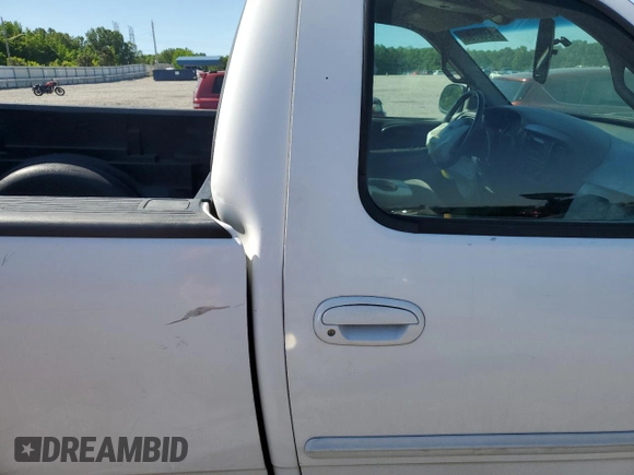 2001 Ford F-150 XL with VIN 1FTRF18L41NB60977, listed as a Copart auction lot 54933785 with 238,700 mi miles and Salvage title. Bid and sale history available at DreamBid. Image 10.