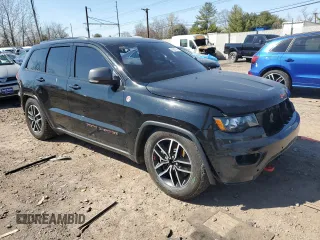 2021 Jeep Grand Cherokee Trailhawk with VIN 1C4RJFLT8MC757858, listed as a Copart auction lot 48200125 with 66,145 mi miles and Salvage Title. Bid and sale history available at carsss.com. Image 4.