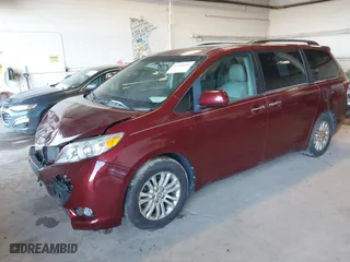 2015 Toyota Sienna XLE with VIN 5TDYK3DC1FS636211, listed as a IAAI auction lot 41710294 with 115,173 mi miles. Bid and sale history available at carsss.com. Image 17.