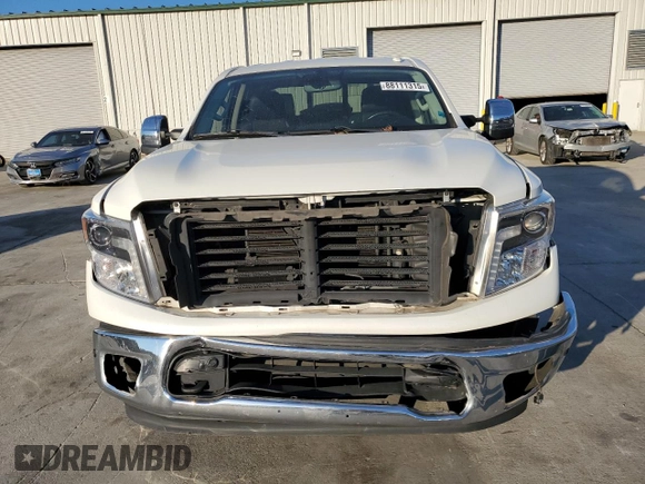 2018 Nissan Titan Pro-4X z VIN 1N6AA1E58JN520184, wystawiony jako Copart lot #88111315 z przebiegiem 93 326 mil mil oraz Szkoda całkowita • Salvage title. Historia ofert i sprzedaży dostępna na DreamBid. Obrazek 5.