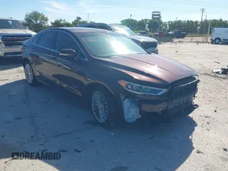 2019 Ford Fusion Hybrid Titanium with VIN 3FA6P0RU2KR123786, listed as a IAAI auction lot 41857026 with 49,604 mi miles. Bid and sale history available at carsss.com. Image 1.