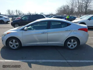 2011 Hyundai Elantra Ltd with VIN KMHDH4AE9BU140051, listed as a IAAI auction lot 41721100 with 185,075 mi miles. Bid and sale history available at carsss.com. Image 13.