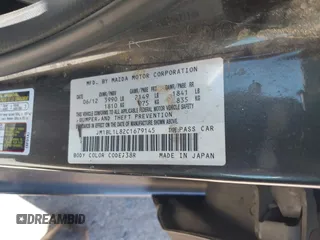 2012 Mazda 3 i Touring with VIN JM1BL1L82C1679145, listed as a IAAI auction lot 42239504 with 454,704 mi miles and . Bid and sale history available at DreamBid. Image 9.