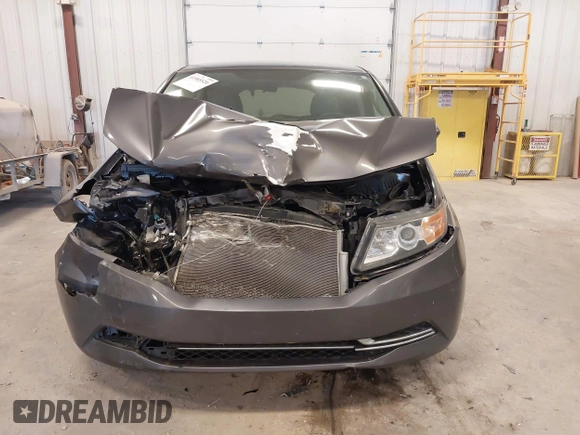 2016 Honda Odyssey SE with VIN 5FNRL5H38GB039652, listed as a IAAI auction lot 41985520 with Not Provided miles and . Bid and sale history available at DreamBid. Image 12.