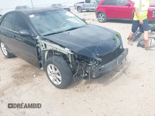 2005 Toyota Camry LE with VIN 4T1BF32K15U091945, listed as a IAAI auction lot 42124503 with 212,951 mi miles and . Bid and sale history available at DreamBid. Image 18.