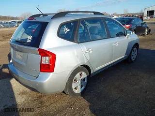 2009 Kia Rondo LX with VIN KNAFG526397251598, listed as a IAAI auction lot 41887875 with 212,074 mi miles. Bid and sale history available at carsss.com. Image 4.