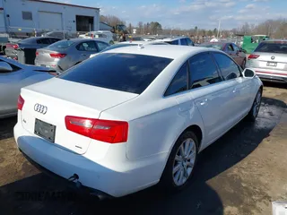 2015 Audi A6 2.0T Premium Plus with VIN WAUGFAFC6FN012134, listed as a IAAI auction lot 41363086 with 103,339 mi miles. Bid and sale history available at carsss.com. Image 4.