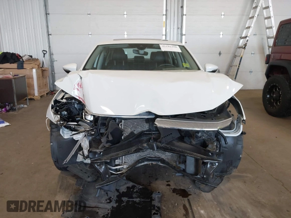 2021 Volkswagen Passat SE with VIN 1VWSA7A30MC014179, listed as a IAAI auction lot 42342358 with 77,535 mi miles and . Bid and sale history available at DreamBid. Image 12.