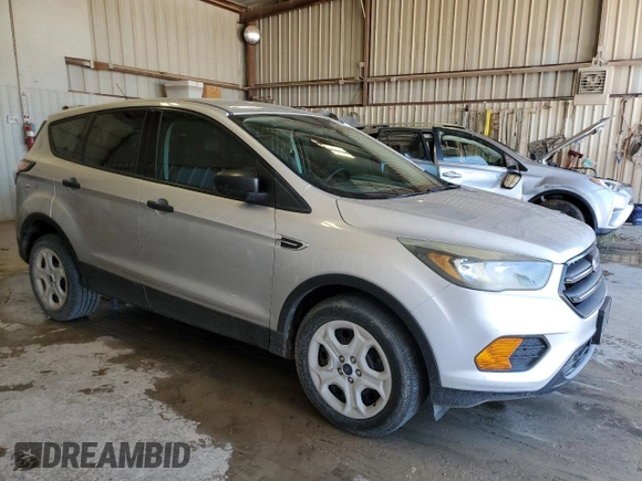 2018 Ford Escape S with VIN 1FMCU0F7XJUA09302, listed as a Copart auction lot 54260785 with 104,197 mi miles and Clean title. Bid and sale history available at DreamBid. Image 4.