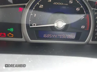 2010 Honda Civic LX-S z VIN 2HGFA1F60AH544781, wystawiony jako IAAI lot #42303801 z przebiegiem 168 544 mil mil oraz . Historia ofert i sprzedaży dostępna na DreamBid. Obrazek 16.
