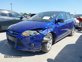 2013 Ford Focus Titanium with VIN 1FADP3J25DL163591, listed as a IAAI auction lot 41973388 with 133,071 mi miles and . Bid and sale history available at carsss.com. Image 2.
