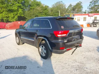 2012 Jeep Grand Cherokee Laredo with VIN 1C4RJFAG5CC234382, listed as a IAAI auction lot 42010153 with 185,078 mi miles. Bid and sale history available at carsss.com. Image 3.