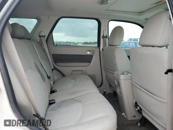 2009 Mercury Mariner with VIN 4M2CU81G49KJ16972, listed as a Copart auction lot 72354504 with 148,966 mi miles and Salvage title. Bid and sale history available at DreamBid. Image 12.