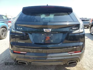 2021 Cadillac XT4 FWD Sport with VIN 1GYFZER44MF015908, listed as a Copart auction lot 52214925 with 94,079 mi miles and Clean Title. Bid and sale history available at carsss.com. Image 6.