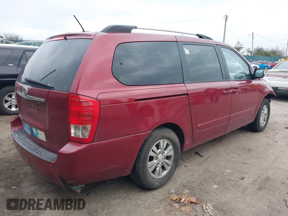 2012 Kia Sedona LX with VIN KNDMG4C75C6422392, listed as a IAAI auction lot 41235462 with 211,653 mi miles. Bid and sale history available at carsss.com. Image 4.
