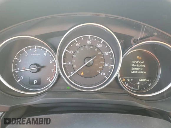 2018 Mazda CX-5 Grand Touring with VIN JM3KFADMXJ1353942, listed as a Copart auction lot 60570835 with 74,400 mi miles and Clean title. Bid and sale history available at DreamBid. Image 9.