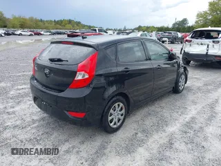 2014 Hyundai Accent GS with VIN KMHCT5AE7EU164658, listed as a IAAI auction lot 41911092 with 132,442 mi miles. Bid and sale history available at carsss.com. Image 4.