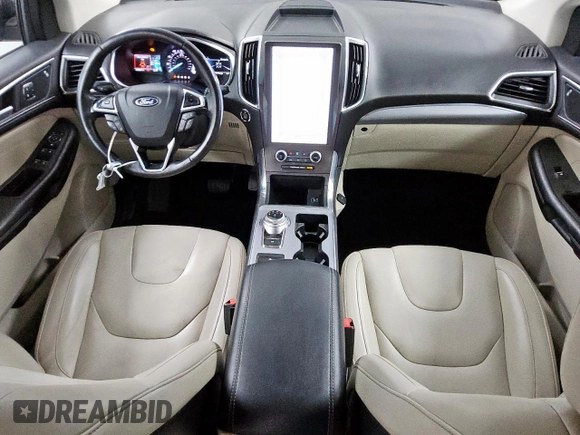 2021 Ford Edge Titanium с VIN 2FMPK4K94MBA27083, выставлен на аукционе Copart как лот 62149285 с пробегом 128 325 миль миль и Чистый • Clean title. История ставок и продаж доступна на DreamBid. Изображение 8.