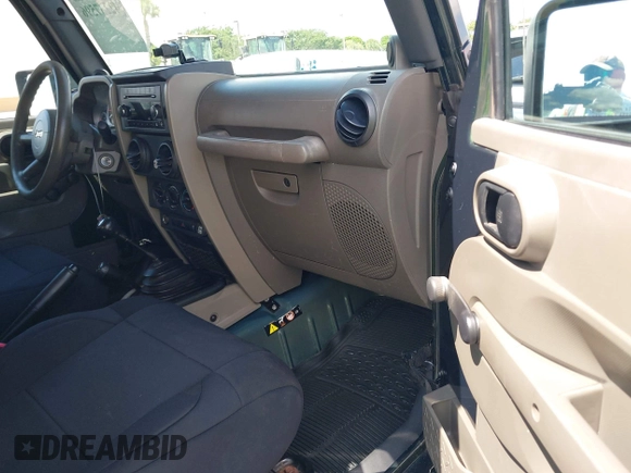 2010 Jeep Wrangler Sport with VIN 1J4AA2D17AL126737, listed as a IAAI auction lot 42237596 with 119,391 mi miles and . Bid and sale history available at carsss.com. Image 5.