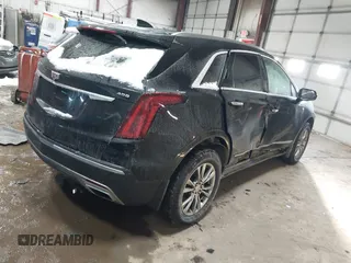 2021 Cadillac XT5 FWD Premium Luxury with VIN 1GYKNCRS3MZ198651, listed as a IAAI auction lot 41607734 with 49,275 mi miles. Bid and sale history available at carsss.com. Image 4.