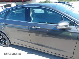 2019 Ford Fusion Titanium with VIN 3FA6P0D91KR104827, listed as a IAAI auction lot 42221526 with 141,316 mi miles and . Bid and sale history available at DreamBid. Image 13.