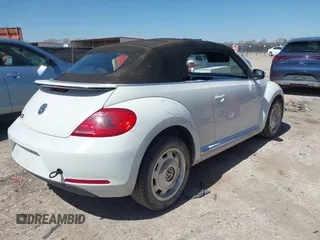 2015 Volkswagen Beetle 1.8T w/Tech with VIN 3VW517AT9FM810122, listed as a IAAI auction lot 41815980 with 72,420 mi miles and . Bid and sale history available at DreamBid. Image 4.