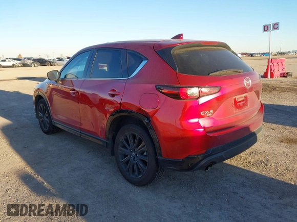 2022 Mazda CX-5 2.5 Turbo with VIN JM3KFBAY4N0564000, listed as a IAAI auction lot 41076013 with 25,106 mi miles and . Bid and sale history available at carsss.com. Image 3.