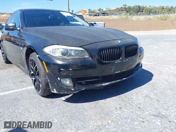 2013 BMW 5 Series 528i with VIN WBAXG5C50DDY35638, listed as a IAAI auction lot 39657715 with 139,765 mi miles and . Bid and sale history available at carsss.com. Image 6.