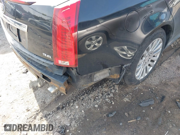 2012 Cadillac CTS with VIN 1G6DM5E39C0106931, listed as a IAAI auction lot 41909732 with 213,319 mi miles and . Bid and sale history available at DreamBid. Image 6.