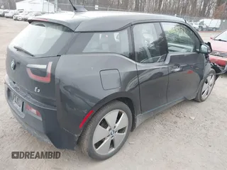 2015 BMW i3 z VIN WBY1Z4C5XFV501268, wystawiony jako IAAI lot #41028732 z przebiegiem 75 283 mil mil oraz . Historia ofert i sprzedaży dostępna na DreamBid. Obrazek 4.