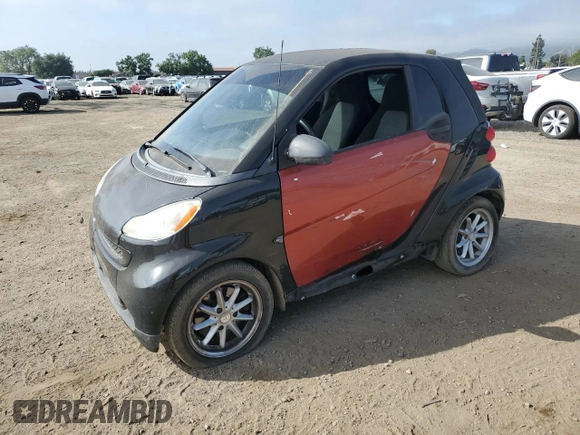 2014 Smart fortwo Pure z VIN WMEEJ3BA1EK753320, wystawiony jako Copart lot #55665555 z przebiegiem 71 305 mil mil oraz Szkody całkowita. Historia ofert i sprzedaży dostępna na DreamBid. Obrazek 1.