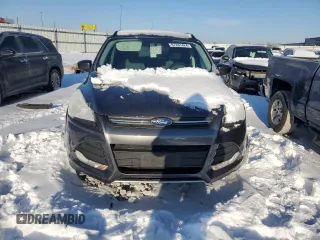 2016 Ford Escape SE z VIN 1FMCU0GX7GUA21205, wystawiony jako Copart lot #87261424 z przebiegiem 112 305 mil mil oraz Szkoda całkowita • Salvage title. Historia ofert i sprzedaży dostępna na DreamBid. Obrazek 5.