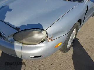 1996 Mercury Sable GS with VIN 1MELM50U5TG605997, listed as a IAAI auction lot 41751266 with 179,662 mi miles. Bid and sale history available at carsss.com. Image 6.