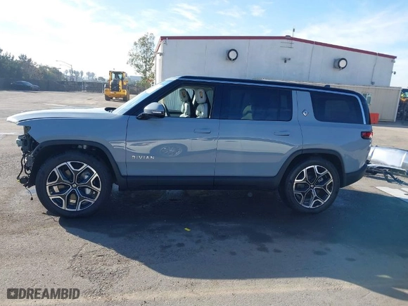 2025 Rivian R1S Adventure with VIN 7PDSGBBA9SN046978, listed as a IAAI auction lot 41467922 with 2,957 mi miles. Bid and sale history available at carsss.com. Image 15.