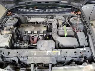 1998 Saturn SL with VIN 1G8ZF5285WZ204569, listed as a Copart auction lot 43624765 with 318,544 mi miles and Salvage Title. Bid and sale history available at carsss.com. Image 13.