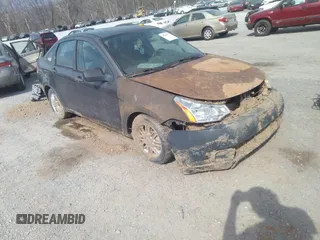 2009 Ford Focus SE with VIN 1FAHP35N39W124199, listed as a IAAI auction lot 41786137 with 104,831 mi miles and . Bid and sale history available at DreamBid. Image 1.