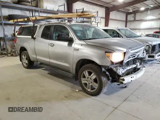 2010 Toyota Tundra 4WD Truck LTD with VIN 5TFBW5F11AX143861, listed as a Copart auction lot 73139324 with 307,545 mi miles and Salvage Title. Bid and sale history available at carsss.com. Image 4.