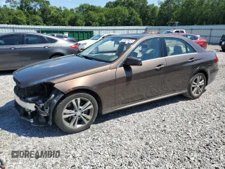 2014 Mercedes-Benz E 350 Luxury with VIN WDDHF8JB5EB004904, listed as a Copart auction lot 56923425 with 135,459 mi miles and Salvage title. Bid and sale history available at DreamBid. Image 1.